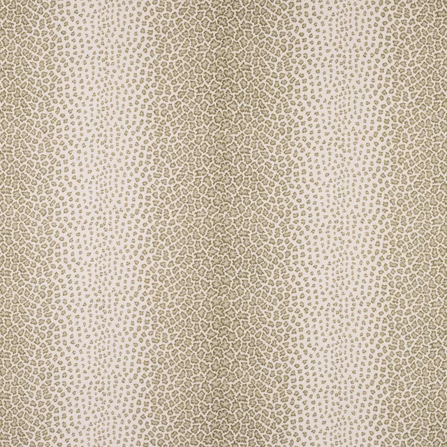 Close-up of small olive animal motif on a pale linen ground