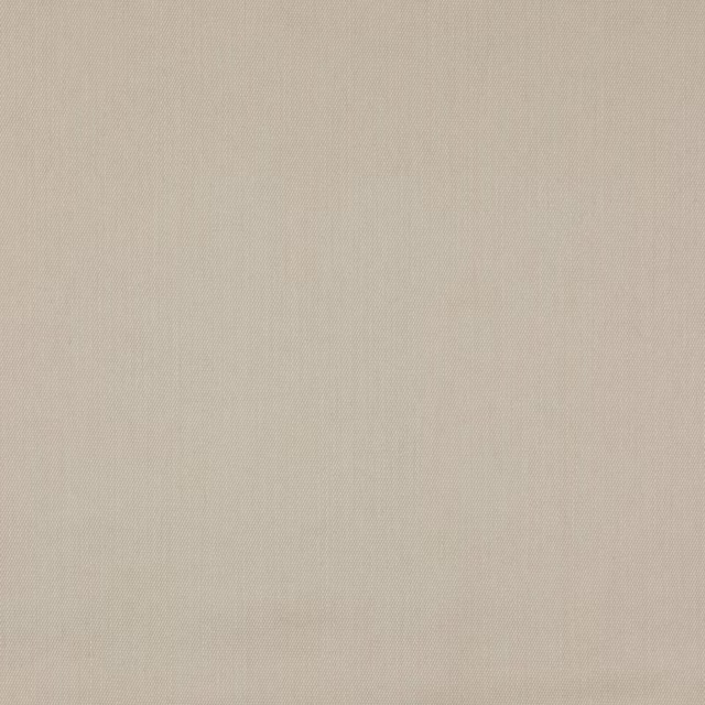 Plain soft warm beige woven fabric with a fine matte texture