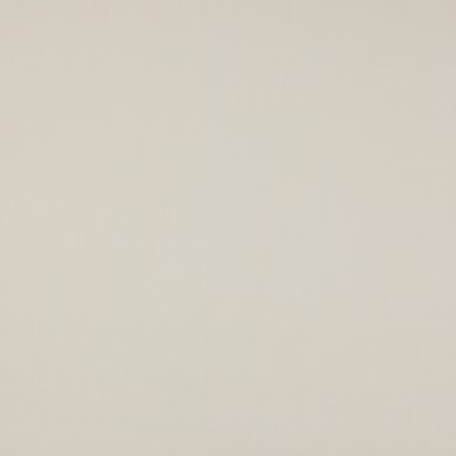Pale ivory plain woven fabric with a soft natural linen texture