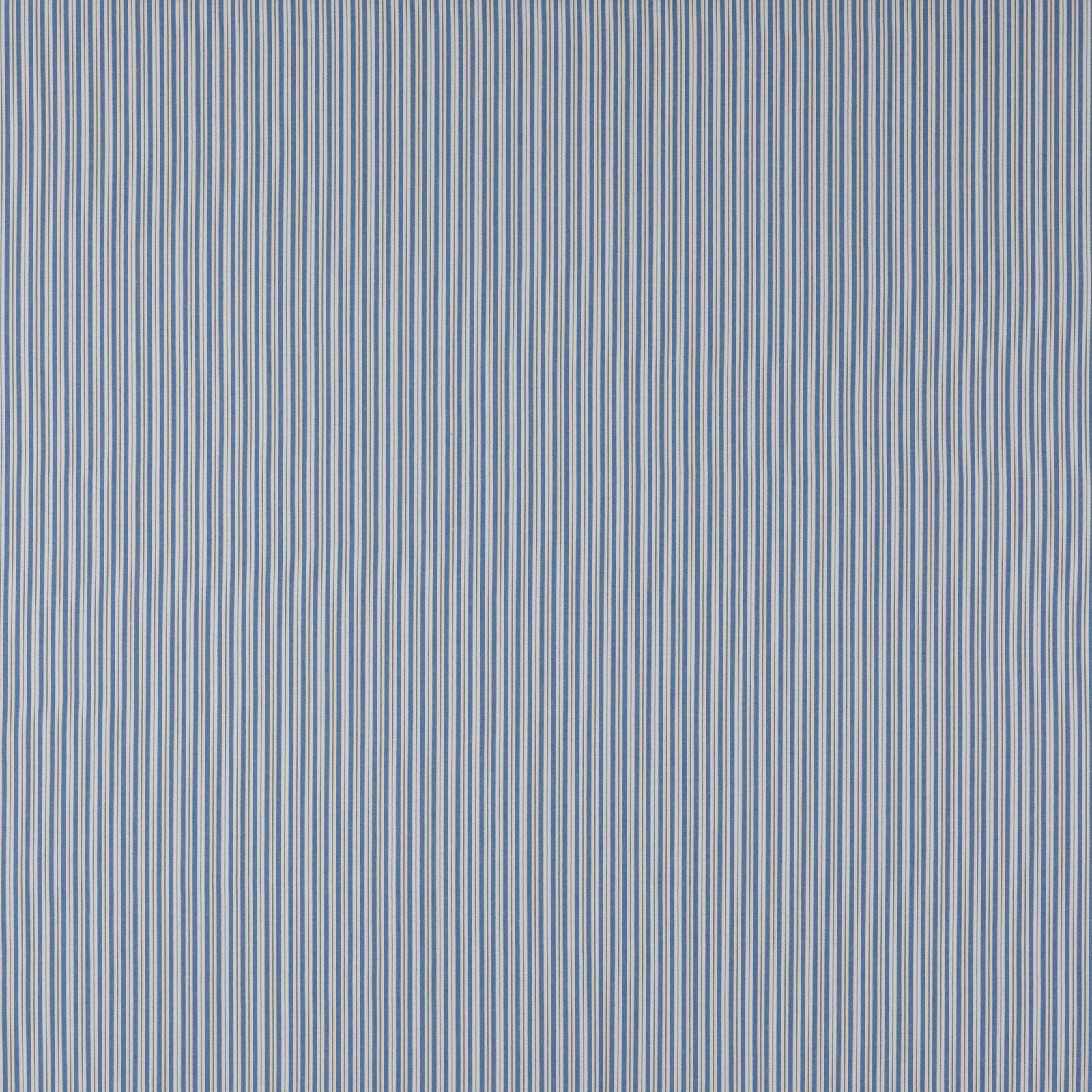 Close-up of fine cobalt blue and pale vertical pinstripes on cotton fabric