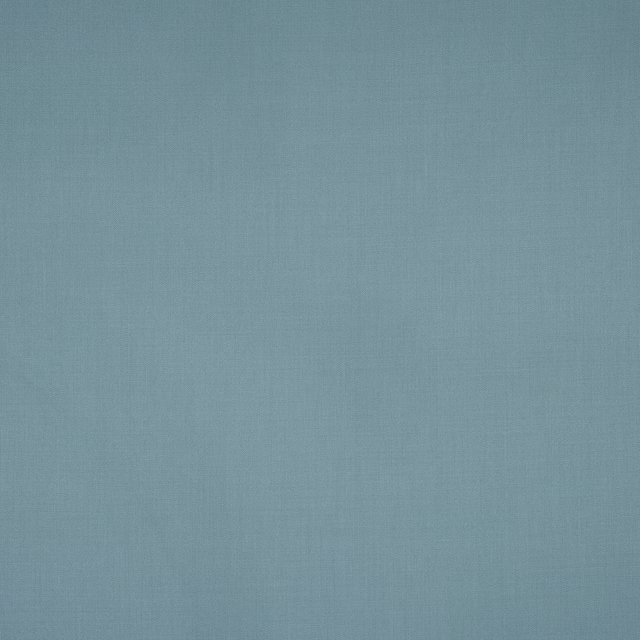 Plain soft aqua wool fabric with a smooth matte texture