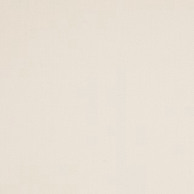 Pale warm ivory wool swatch with fine diagonal woven texture