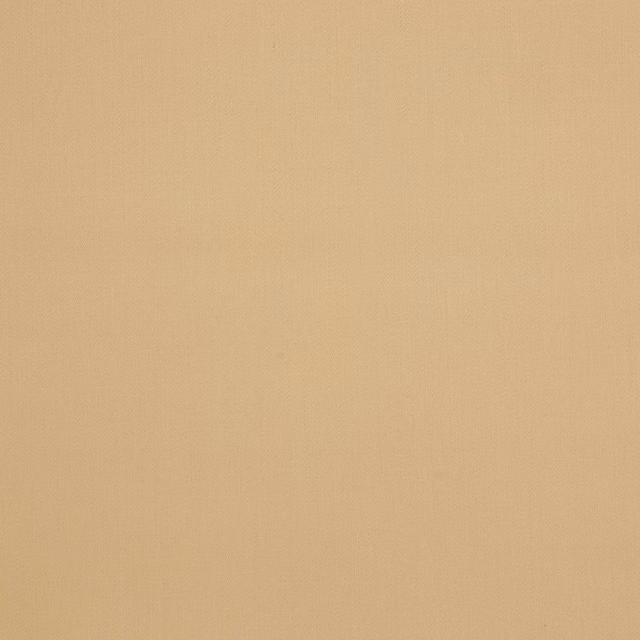 Close-up of a warm honey-beige plain woven wool fabric swatch