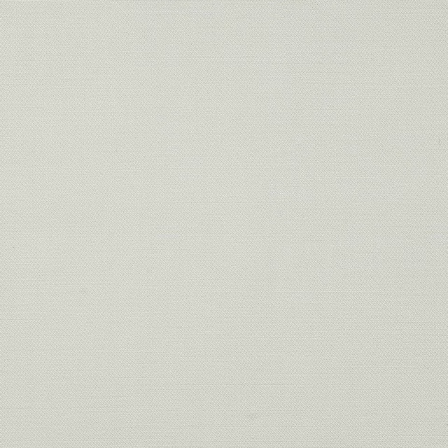 Close-up of pale ice blue plain-woven wool fabric with a fine, even texture