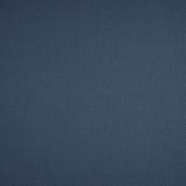Close-up of deep slate-blue wool fabric with a fine plain weave