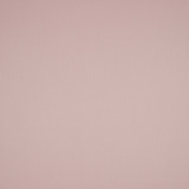 Soft dusty pink wool fabric with a smooth plain weave