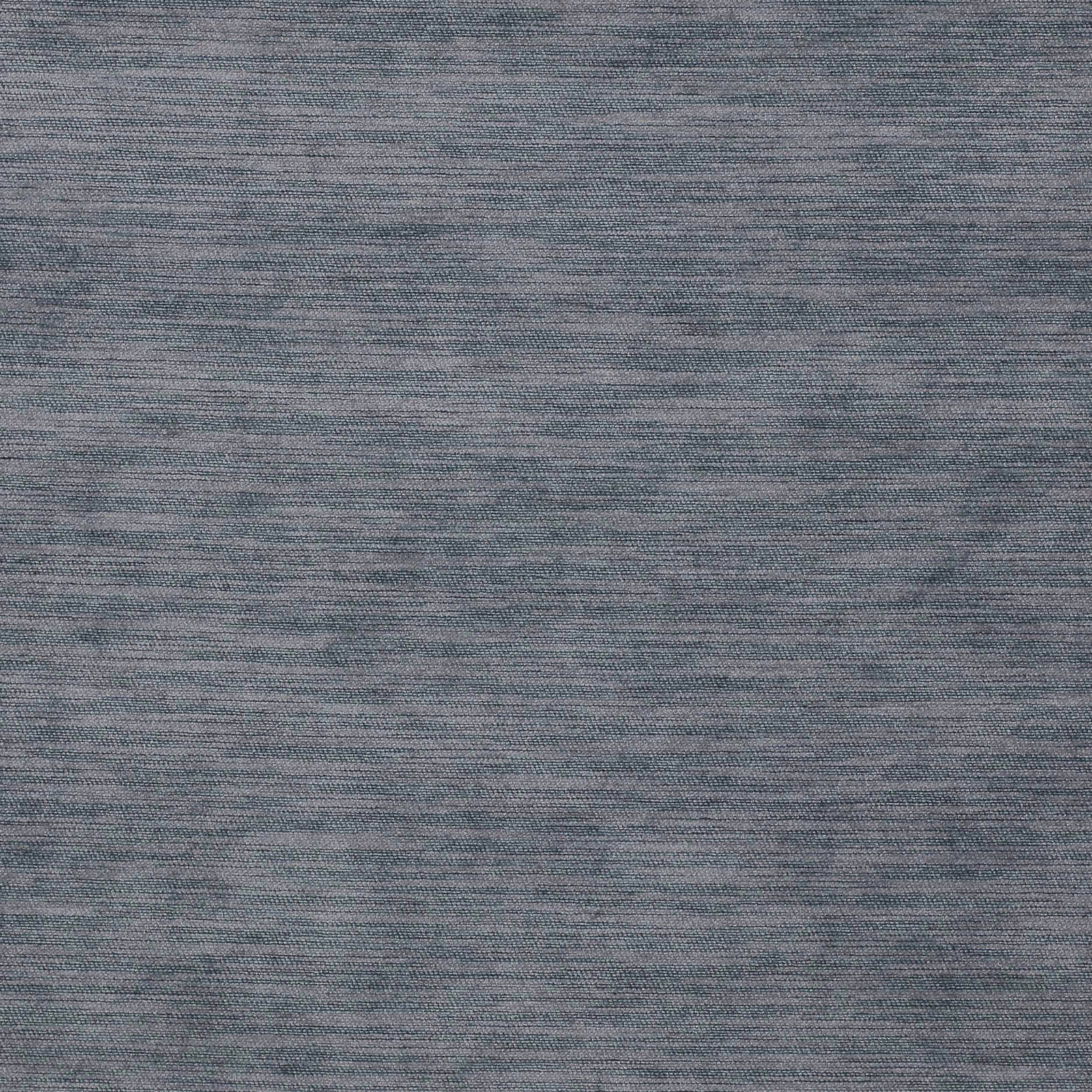 Close-up of a softly mottled slate blue woven fabric with fine texture