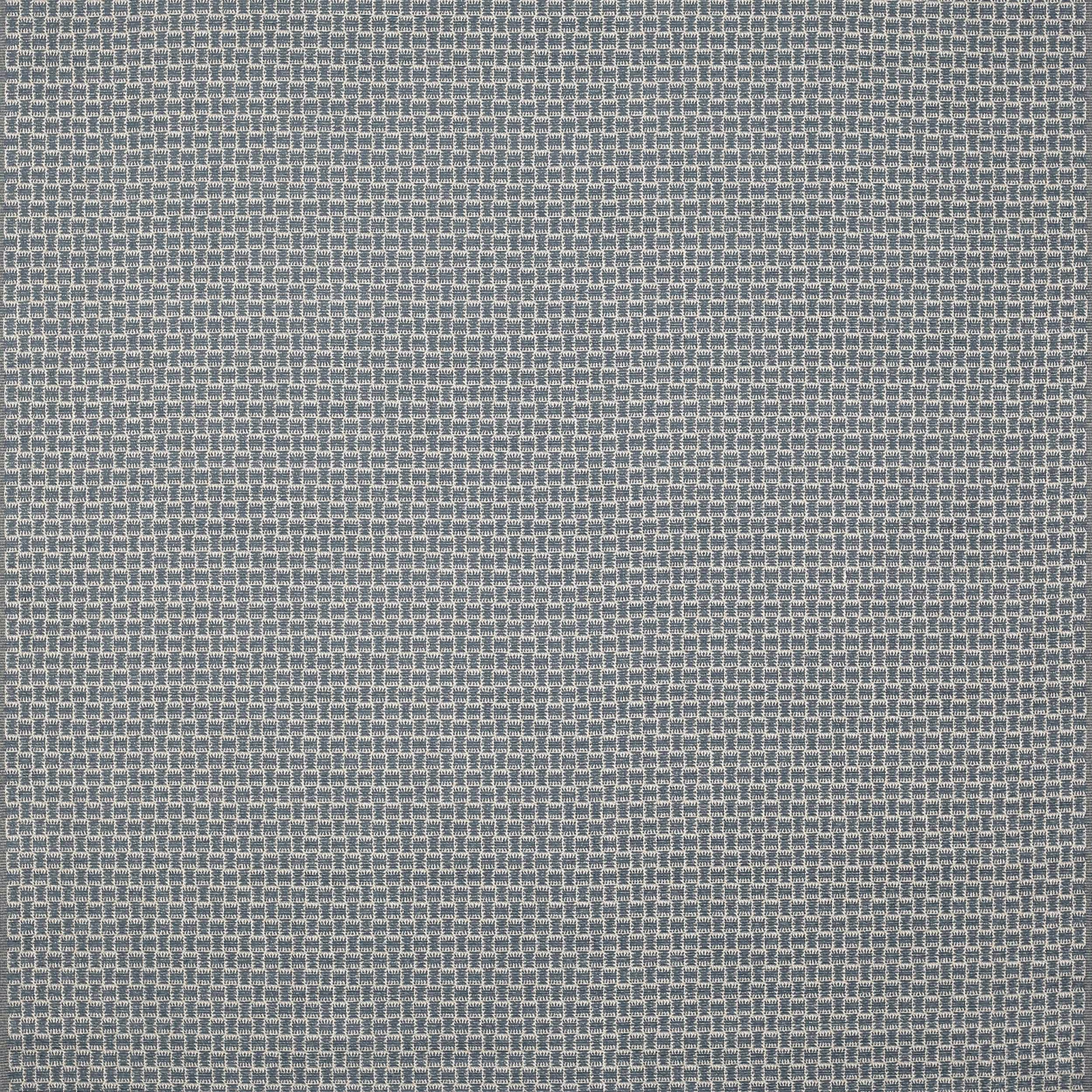 Close-up of a small blue-grey geometric woven fabric with fine textured grid