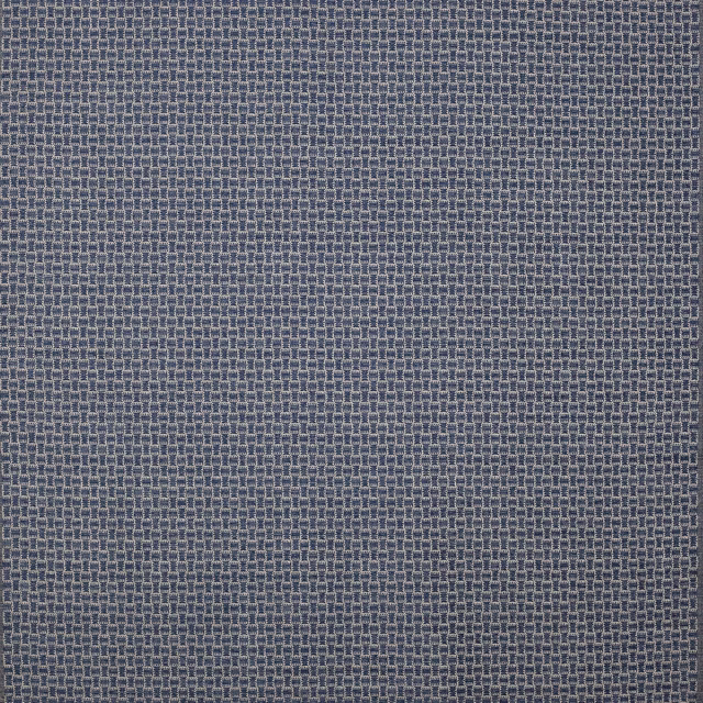 Close-up of a small-scale indigo blue woven fabric with textured grid pattern