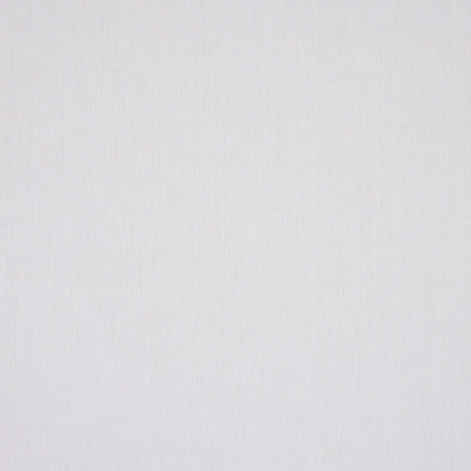 Close-up of soft ivory linen with a fine plain weave and subtle slub texture