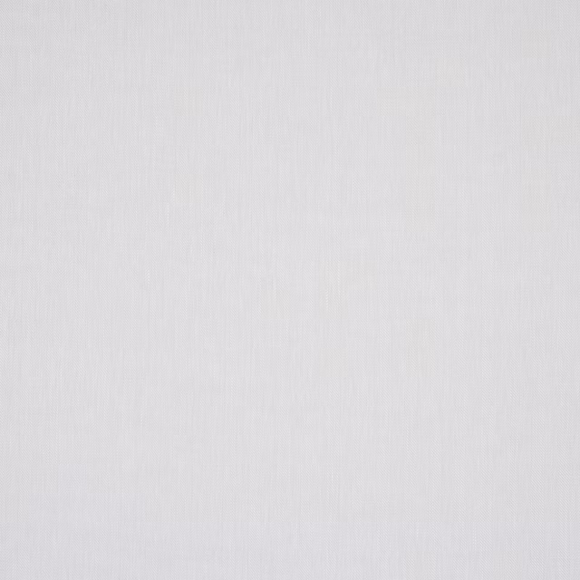 Close-up of soft ivory linen with a fine plain weave and subtle slub texture