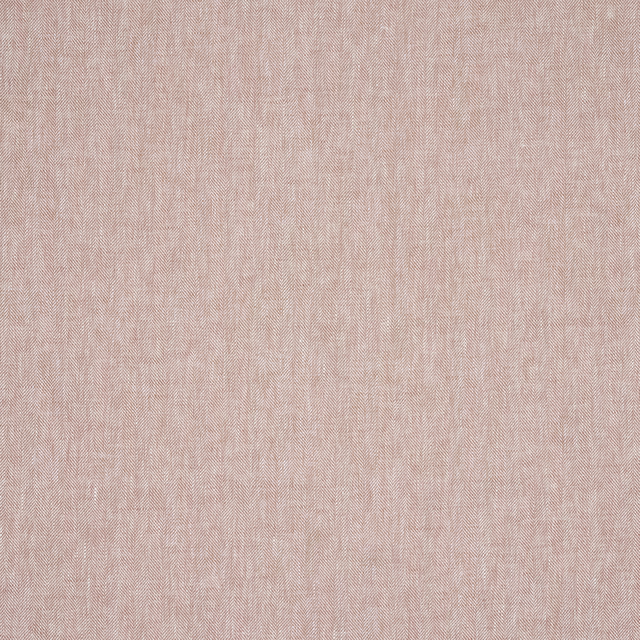 Close-up of soft russet terracotta linen herringbone fabric with fine zigzag texture