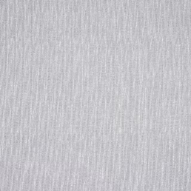Pale silver-grey linen swatch with fine herringbone weave and subtle texture