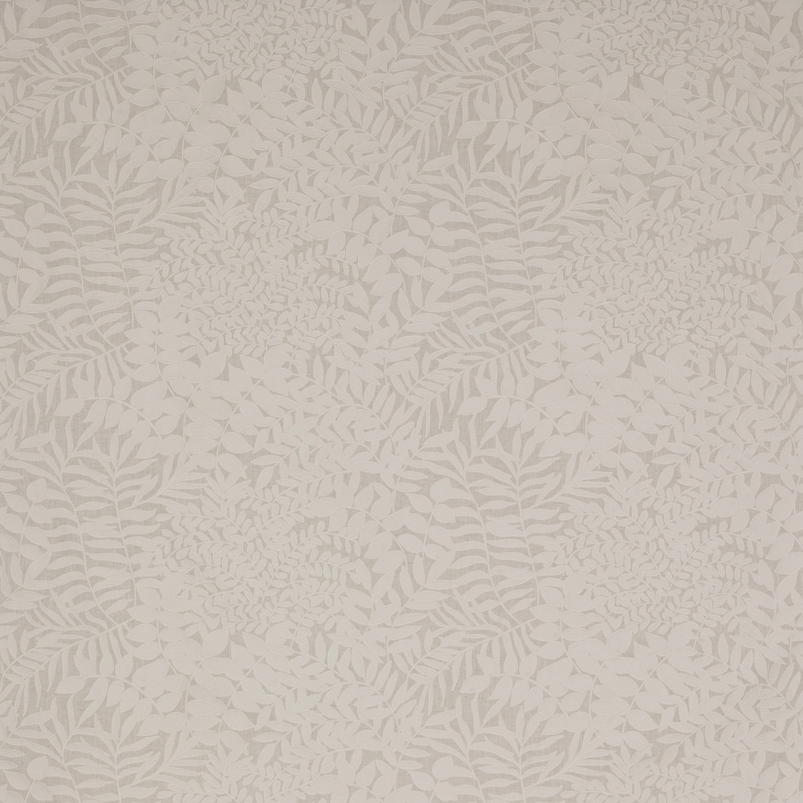 Soft ivory botanical fabric with pale leaf repeat on a textured ground
