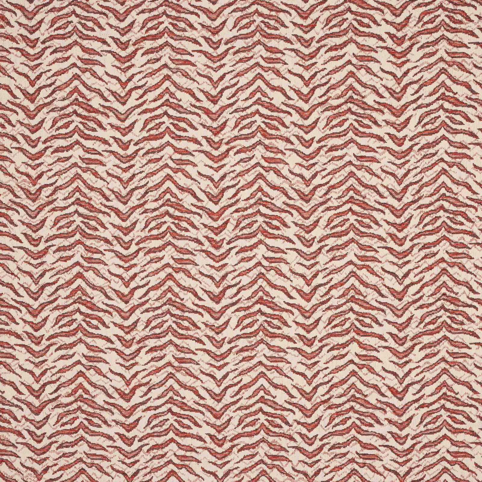Close-up of Tibor Red woven zigzag fabric in muted terracotta and cream