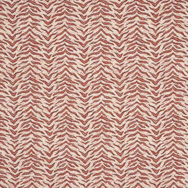 Close-up of Tibor Red woven zigzag fabric in muted terracotta and cream