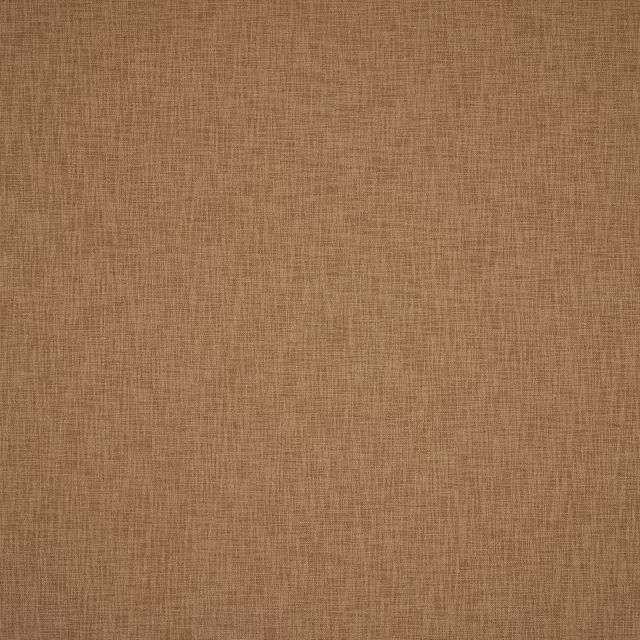 Close-up of a warm caramel brown plain woven fabric with fine texture
