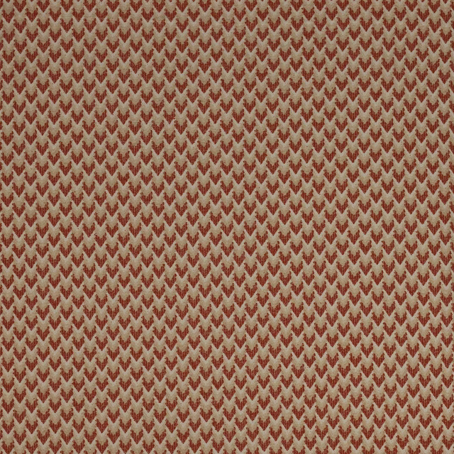 Close-up of a small terracotta chevron weave on a beige textured ground