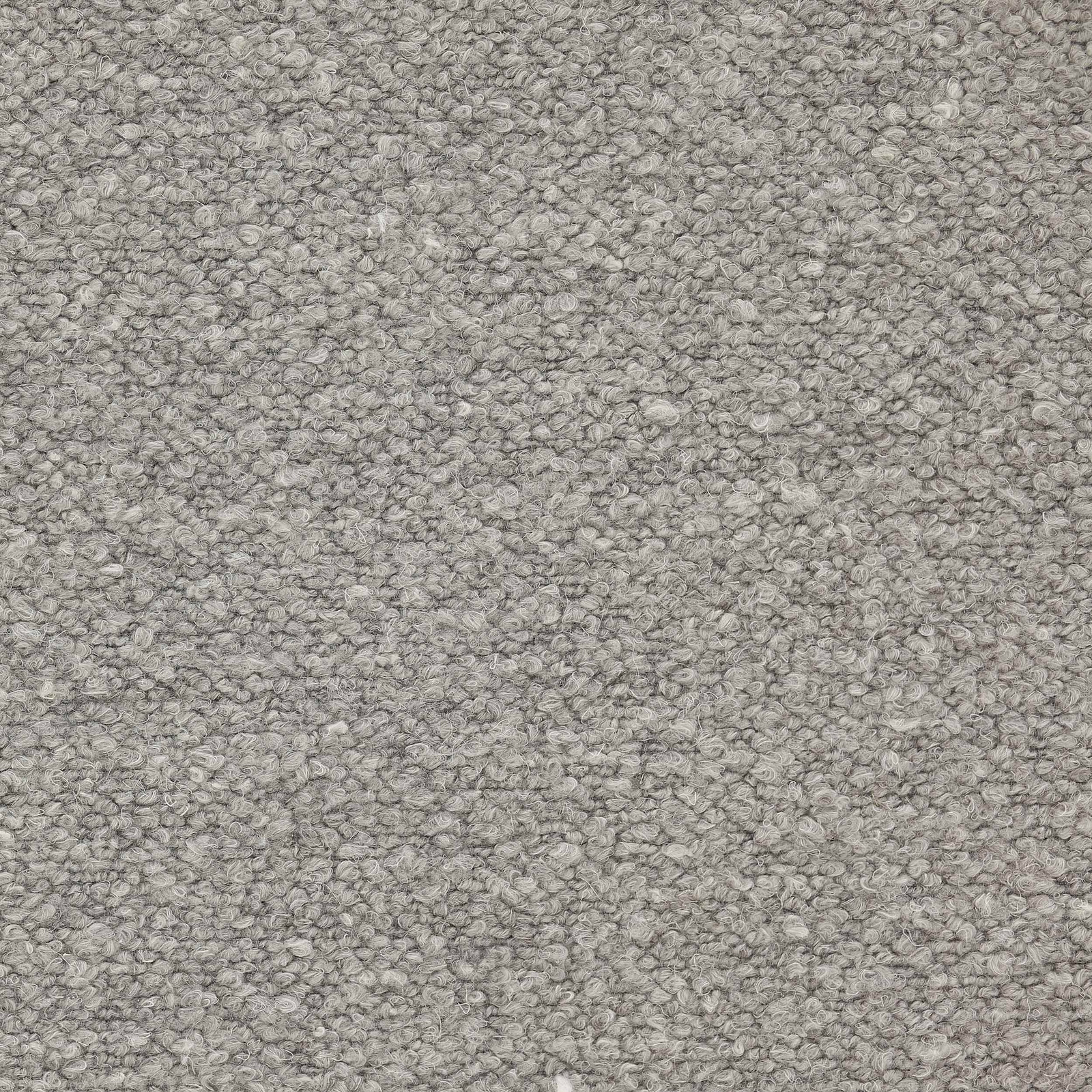 Close-up of soft fog-grey bouclé-style fabric with a pebble texture