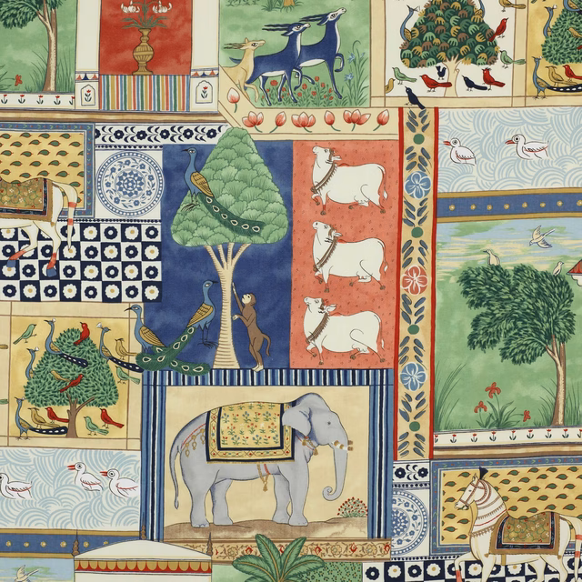 Patterned cotton fabric swatch in deep blue with illustrated animals and trees
