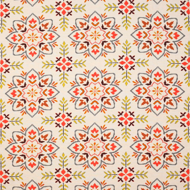 Cream fabric with repeating charcoal-outlined medallions in red, coral and yellow