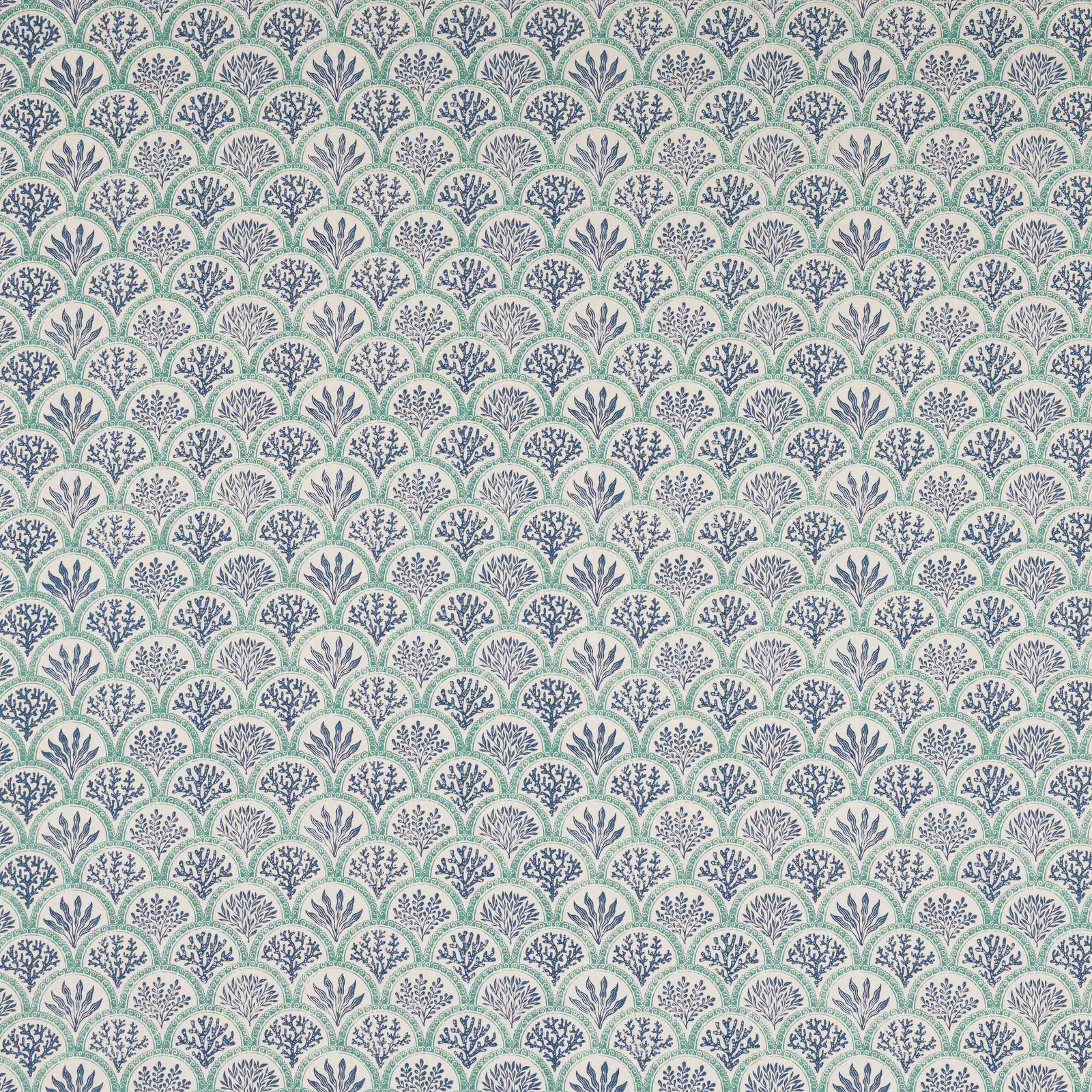Scalloped blue and teal small-print fabric on a pale ground