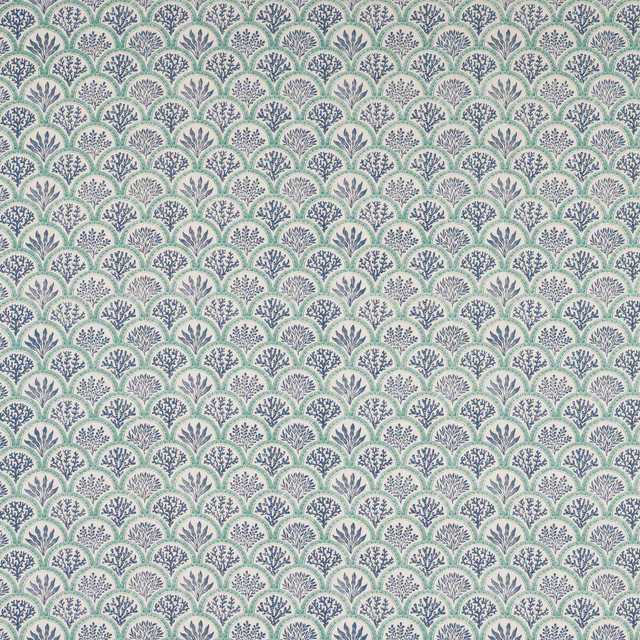 Scalloped blue and teal small-print fabric on a pale ground