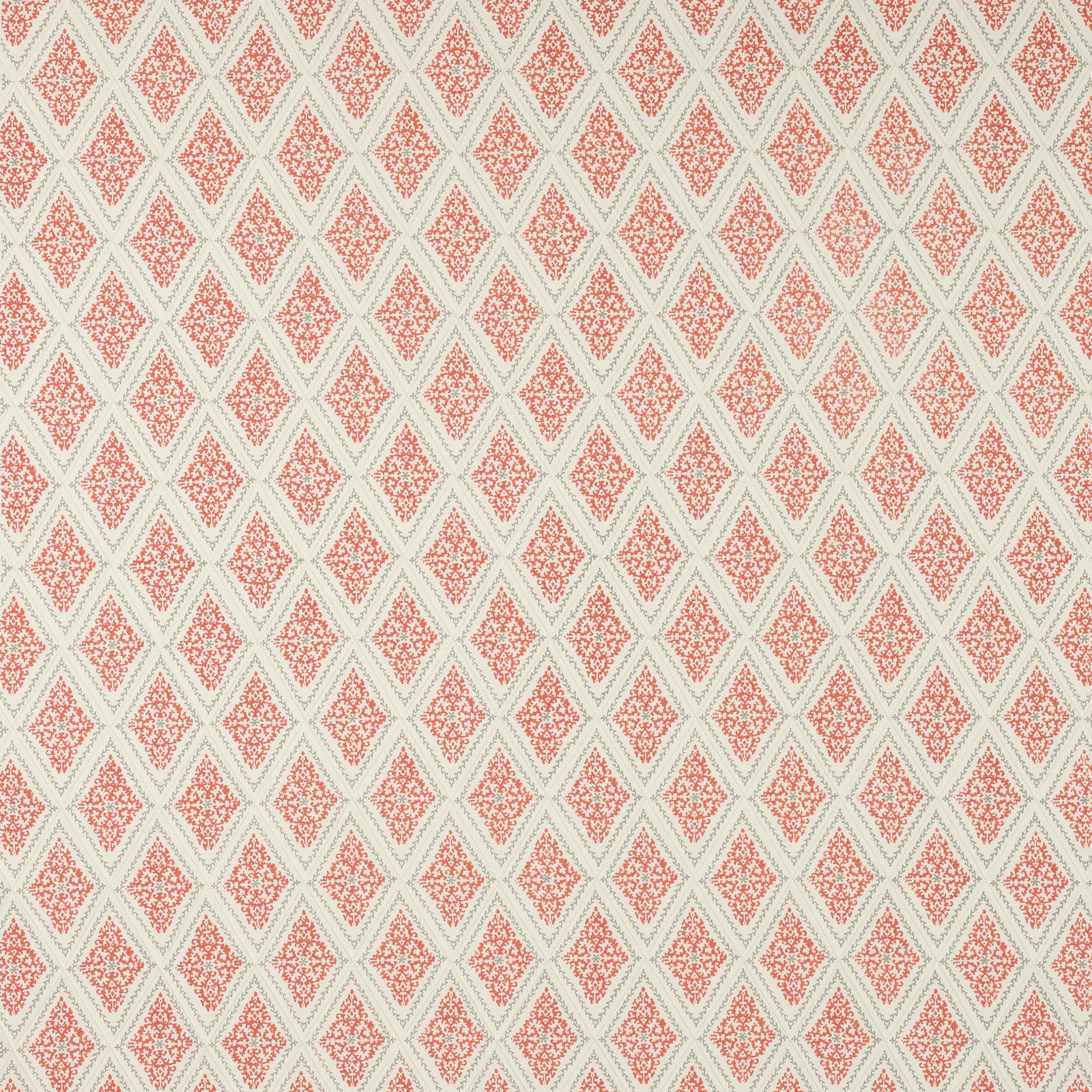 Coral-red diamond motif on a warm ivory cotton fabric with pale green lattice lines
