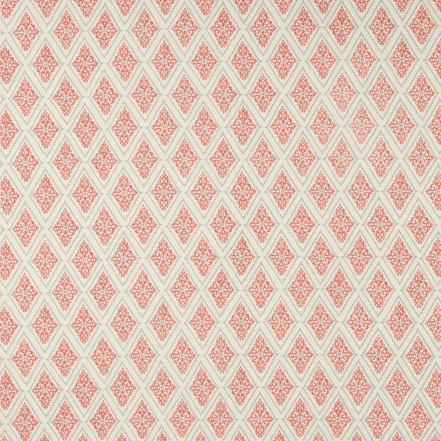 Coral-red diamond motif on a warm ivory cotton fabric with pale green lattice lines