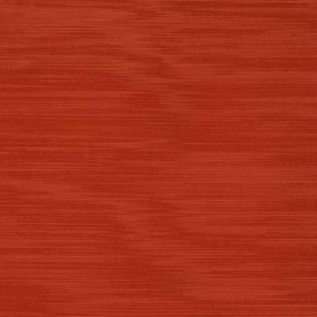 Burnt orange terracotta fabric with fine horizontal ribbed texture