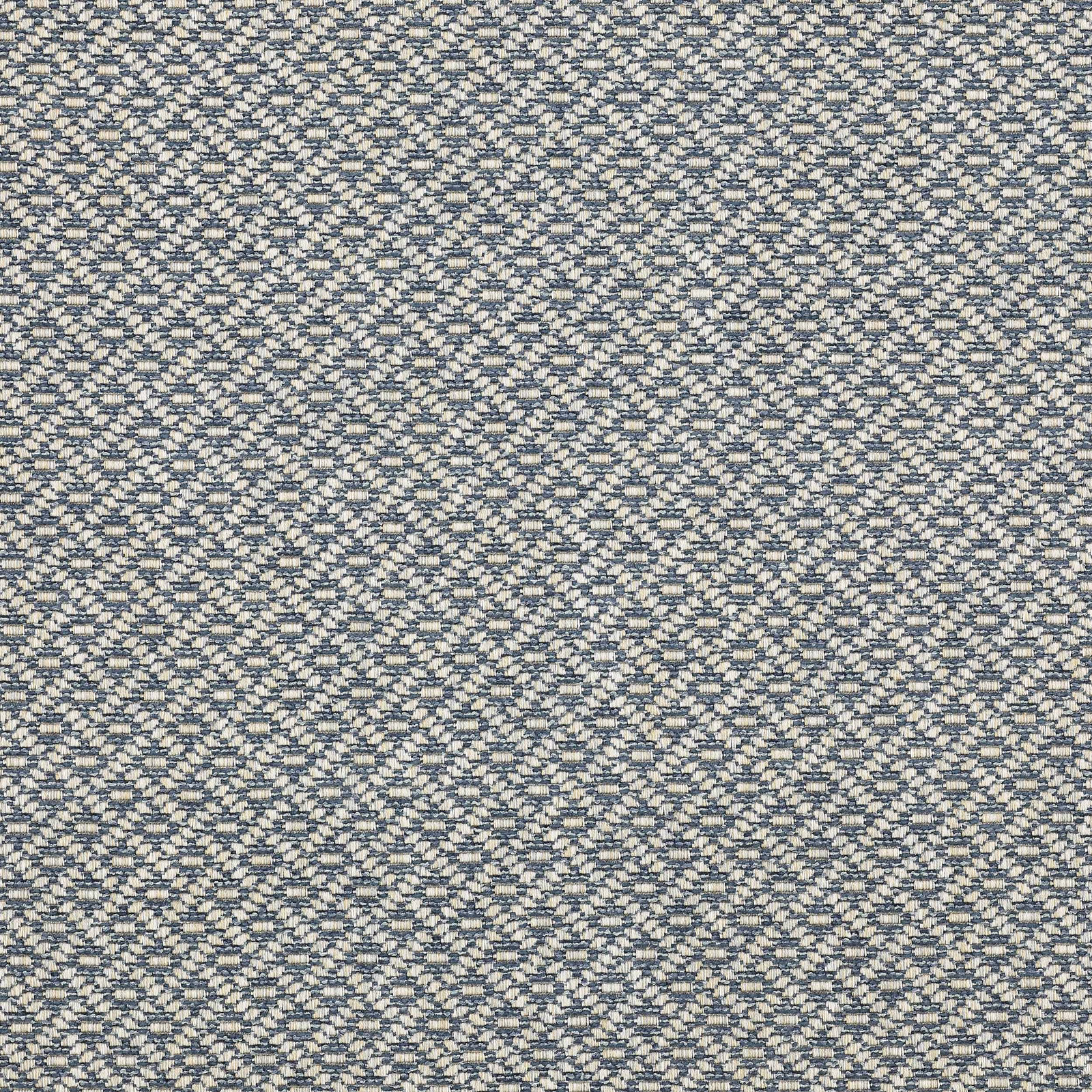 Close-up of a small blue-and-cream geometric woven fabric with a textured surface