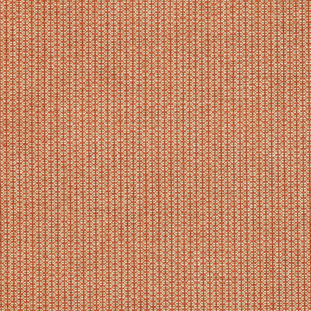 Close-up of a small woven red and beige fabric with a textured grid effect