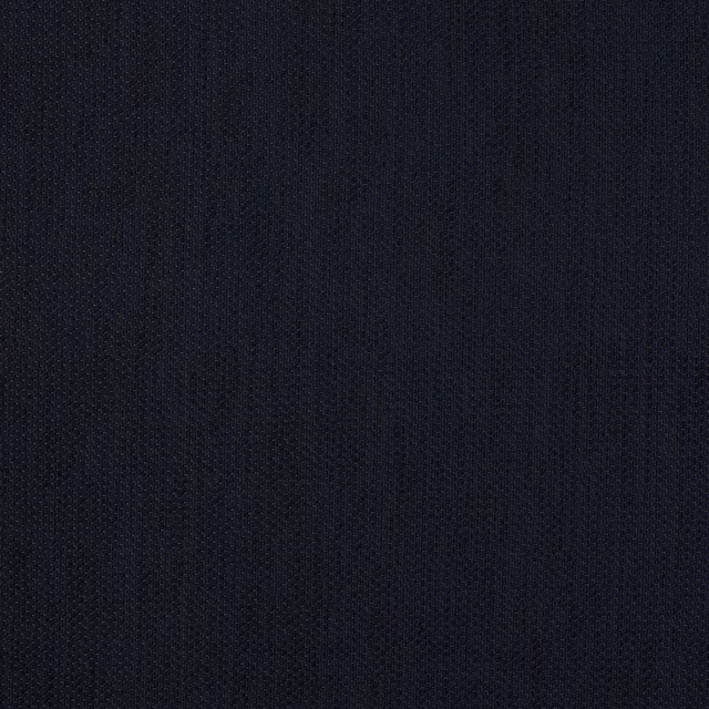 Close-up of a deep midnight blue plain woven fabric with fine texture