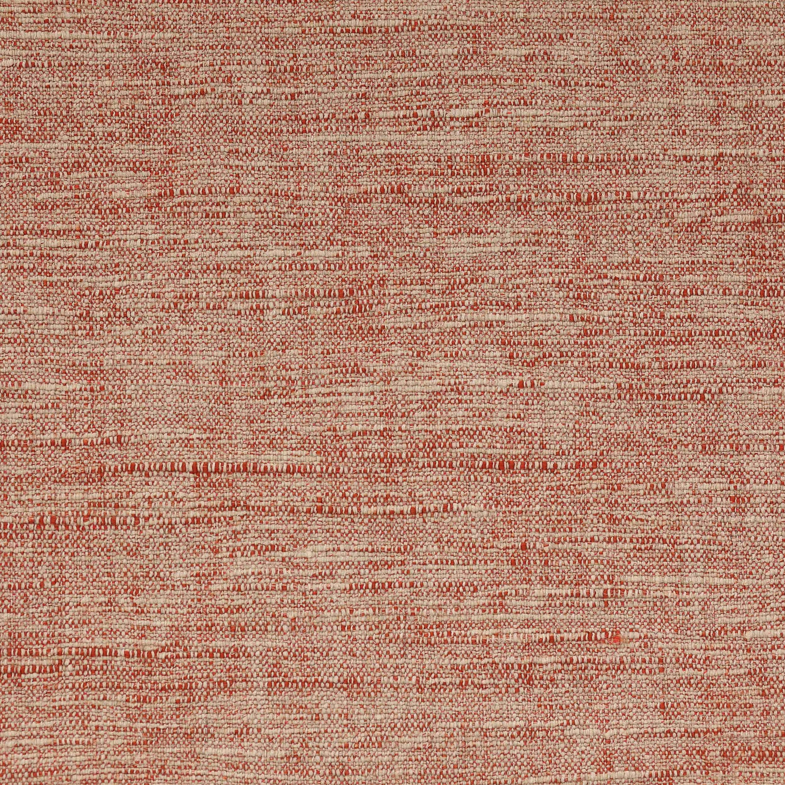 Close-up of a textured terracotta woven fabric with cream and rust flecks