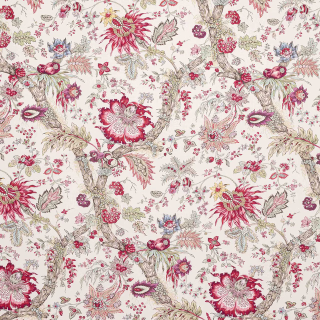 Ivory floral fabric with vivid cerise blossoms, leafy branches and fine botanical detail