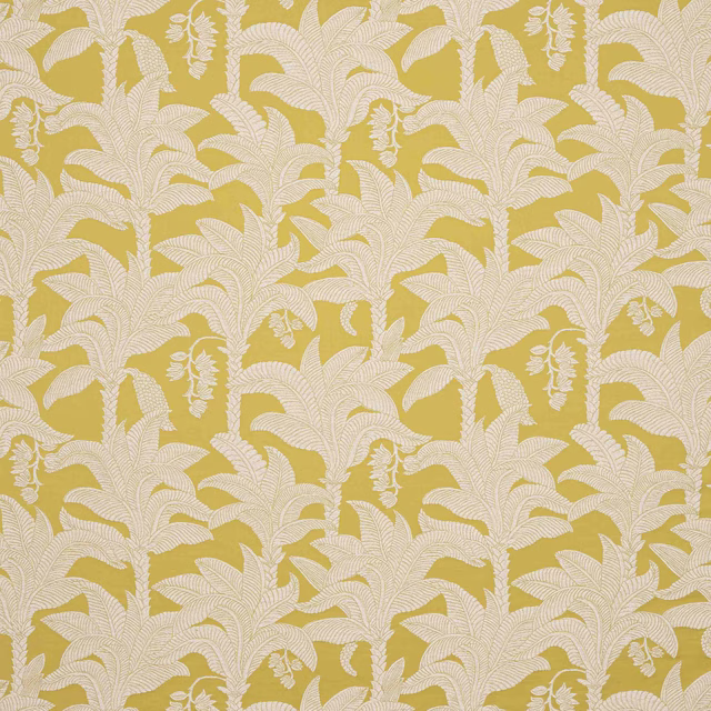 Golden yellow botanical fabric with ivory leaf motif and woven texture