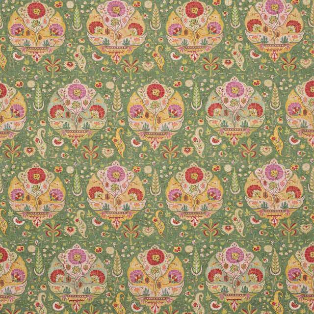 Green floral linen fabric with repeating decorative tree motifs in pink, cream and yellow