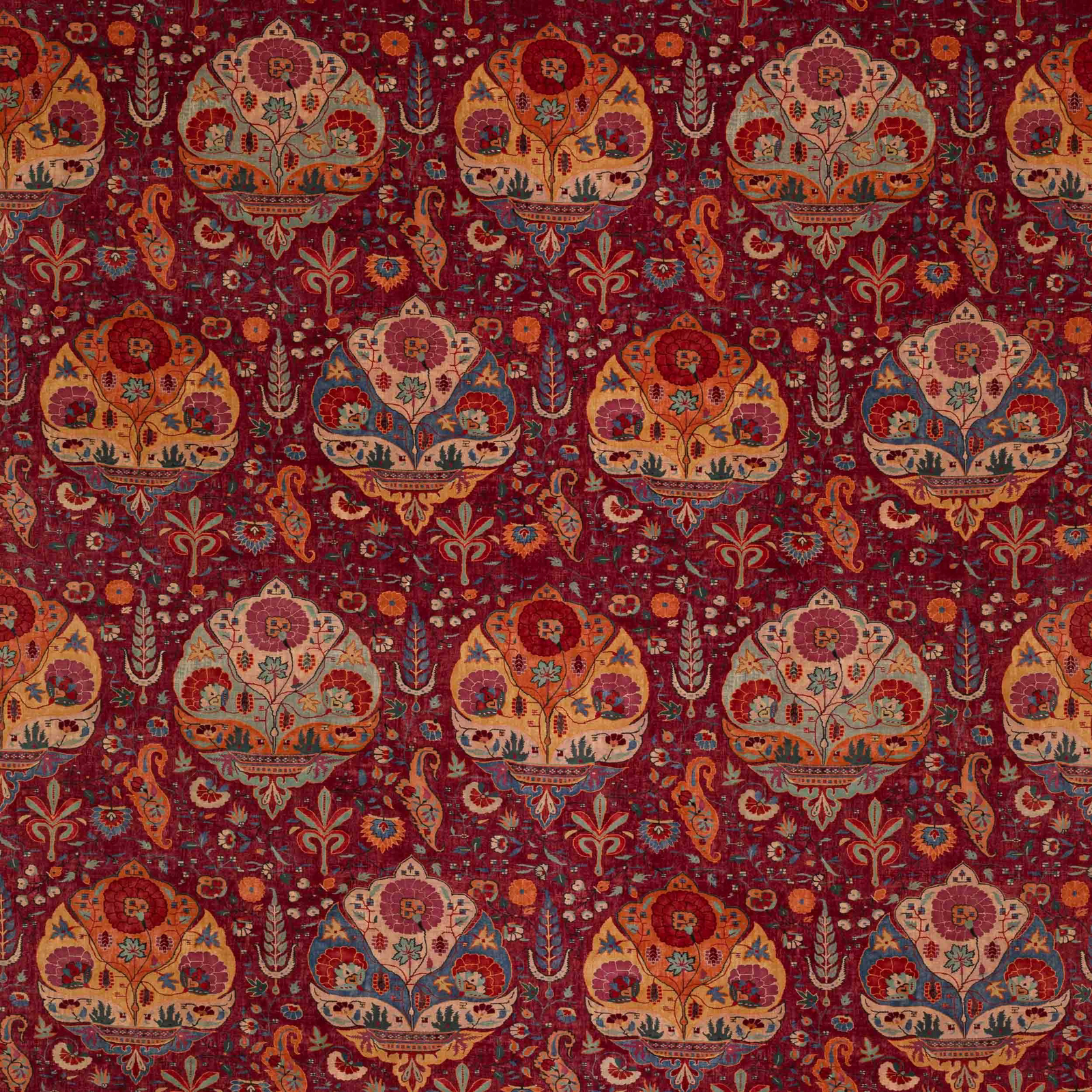 Patterned fabric swatch in deep garnet red with multicoloured floral medallions