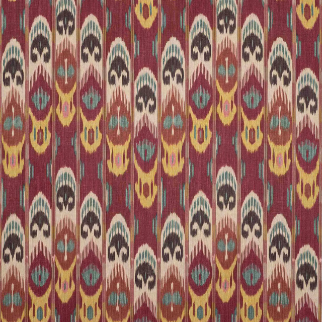 Cerise linen fabric with vertical ikat-style motifs in cream, charcoal, teal and ochre