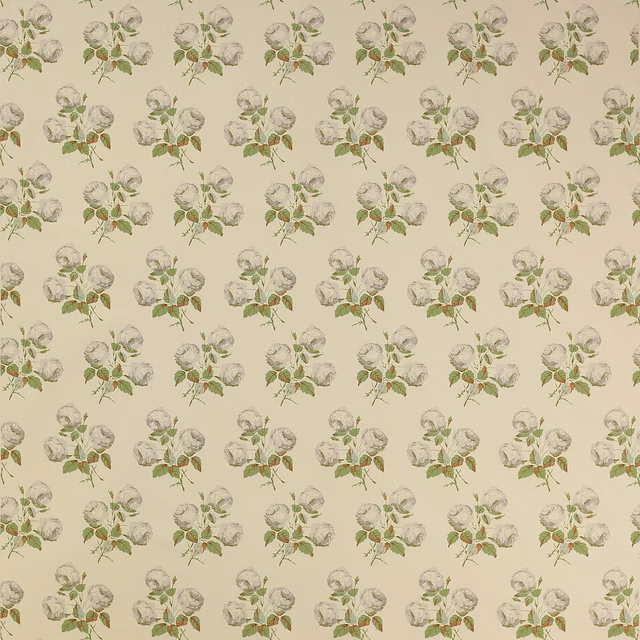 Small grey-green rose sprigs scattered on a warm ivory fabric ground
