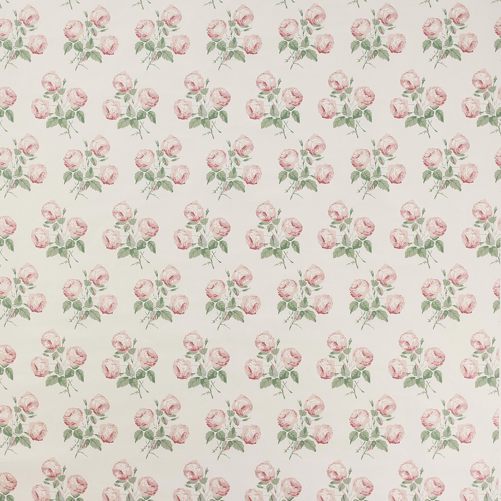 Small pink rose sprays and green leaves on a pale ivory cotton ground
