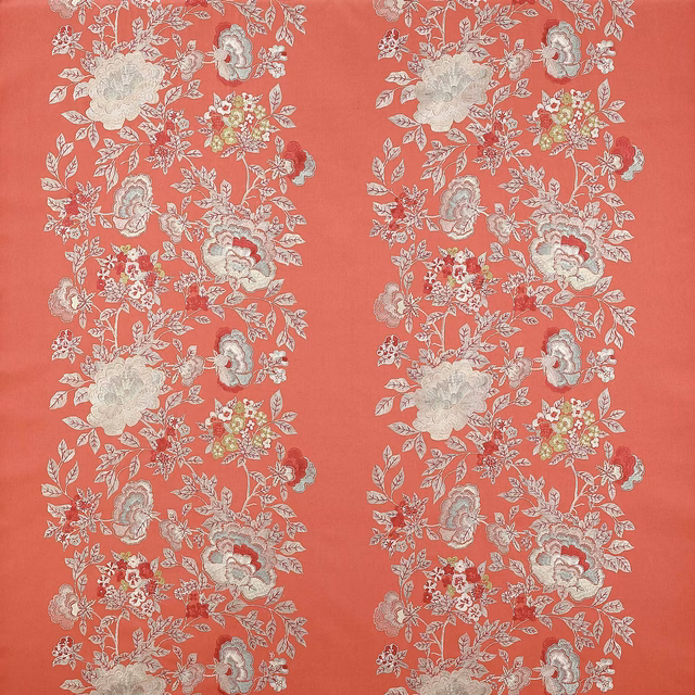 Coral-red floral stripe fabric with pale blossoms and leafy trailing vine