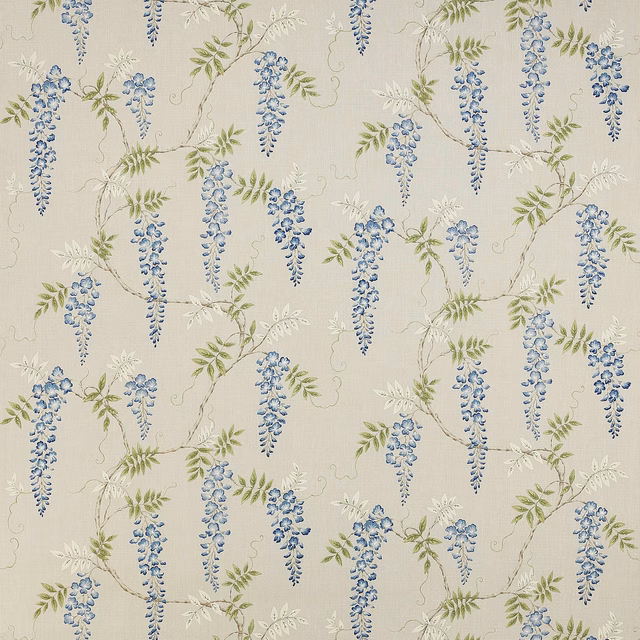 Blue wisteria floral linen with pale green trailing leaves on a light ground