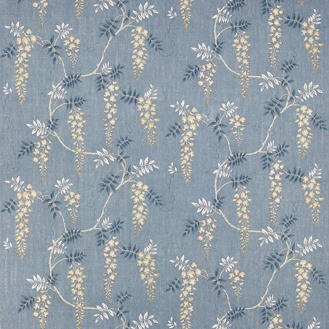 Blue-grey linen fabric with trailing floral branches and pale blossom clusters