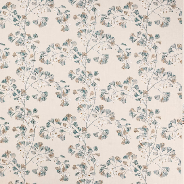 Botanical linen fabric with soft old blue leaves on a pale ground