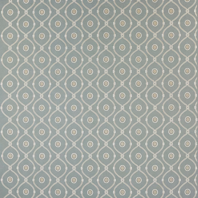 Soft blue patterned fabric with ivory geometric lattice and small round motifs
