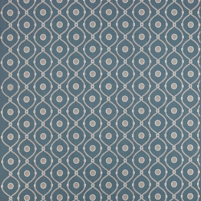 Blue geometric fabric with white outlined teardrop lattice and small dot centres