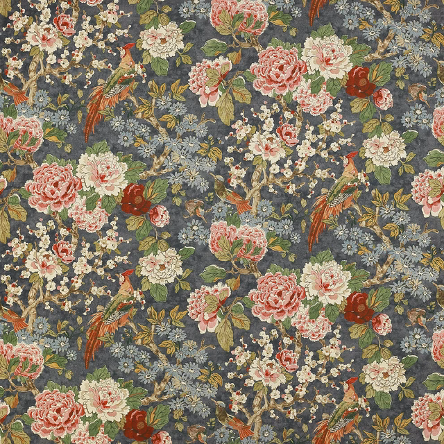 Floral linen fabric with birds and blossoms on a deep navy ground