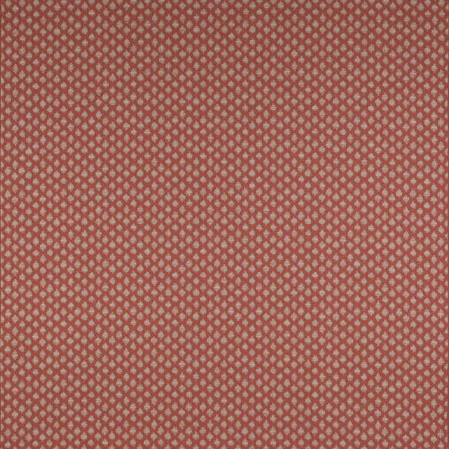 Small coral orange geometric woven fabric with tiny pale diamond motifs