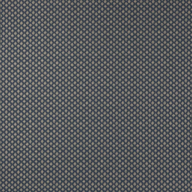 Close-up of small navy geometric woven fabric with pale motif